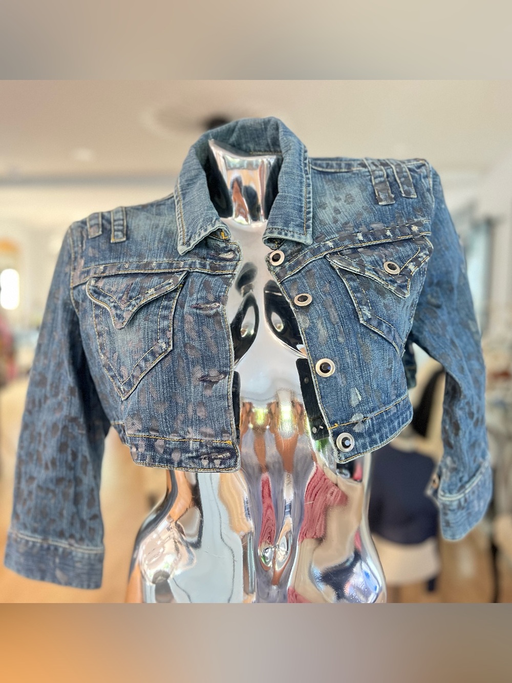 bebe Cropped Blue Washed Denim Jacket with Grommet Details